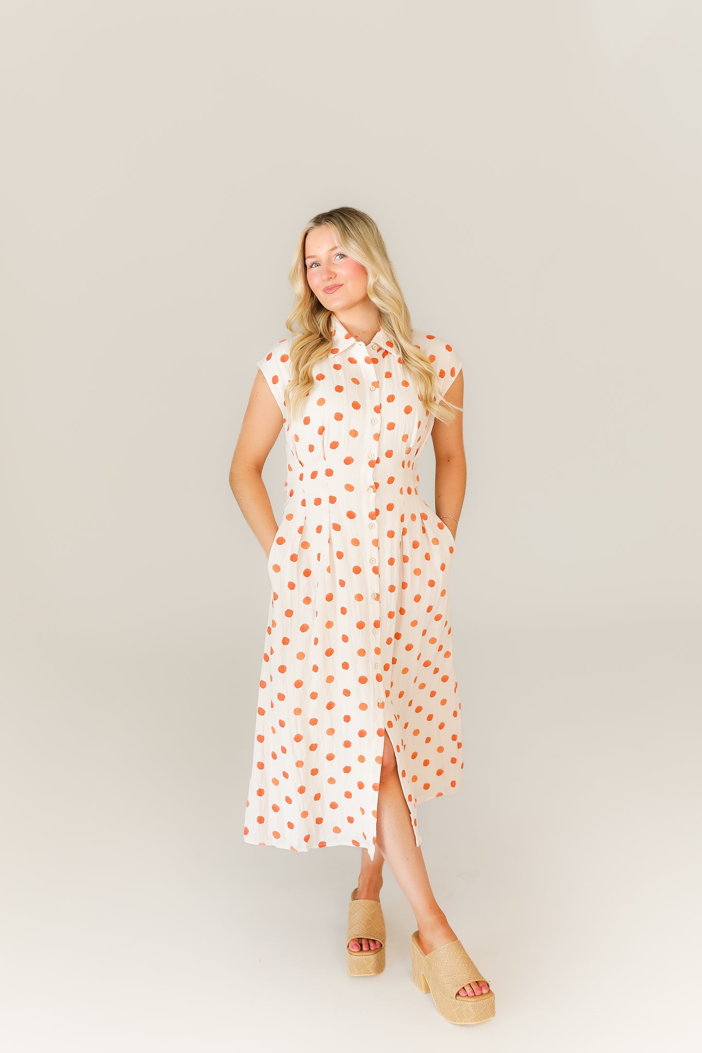 White polka dot midi dress with halter neckline boutique style