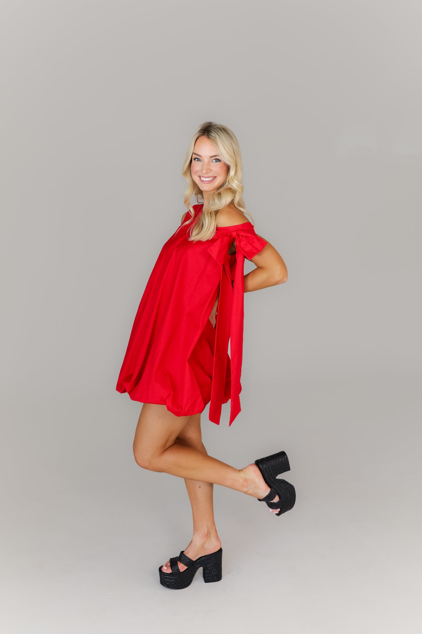 Women’s red bubble game day dress with tie-shoulder boutique style