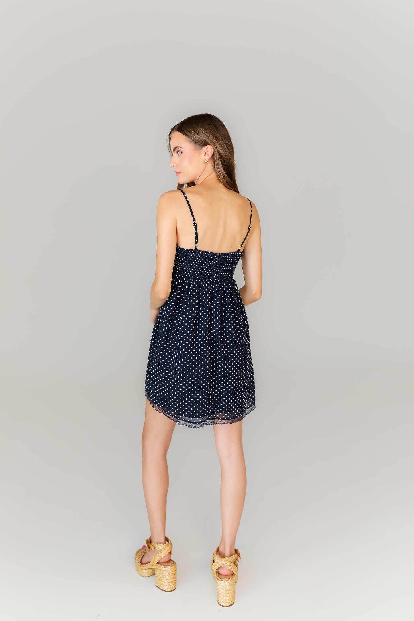 Navy strappy mini dress with flowy silhouette boutique style