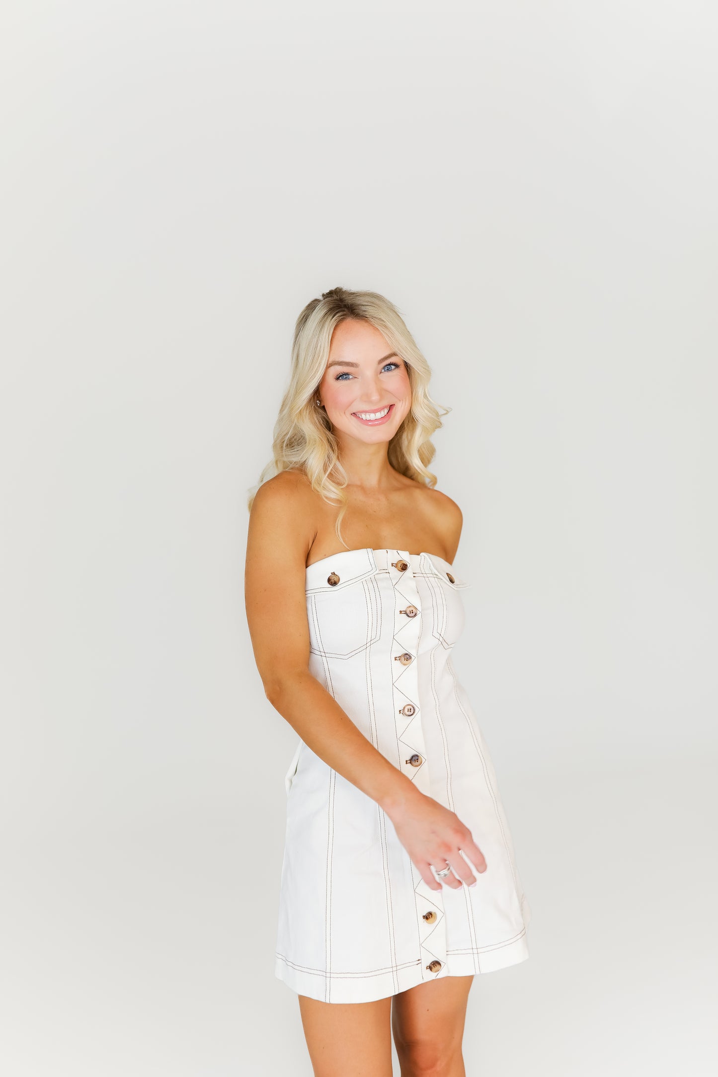 White mini dress with button front