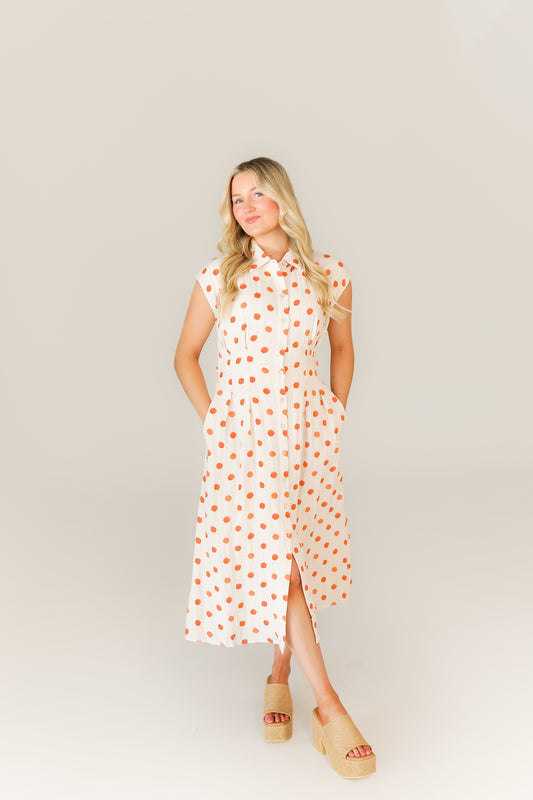 White polka dot midi dress with halter neckline boutique style