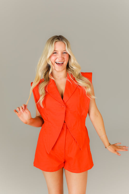 Orange sleeveless romper with collar boutique women’s game day outfit