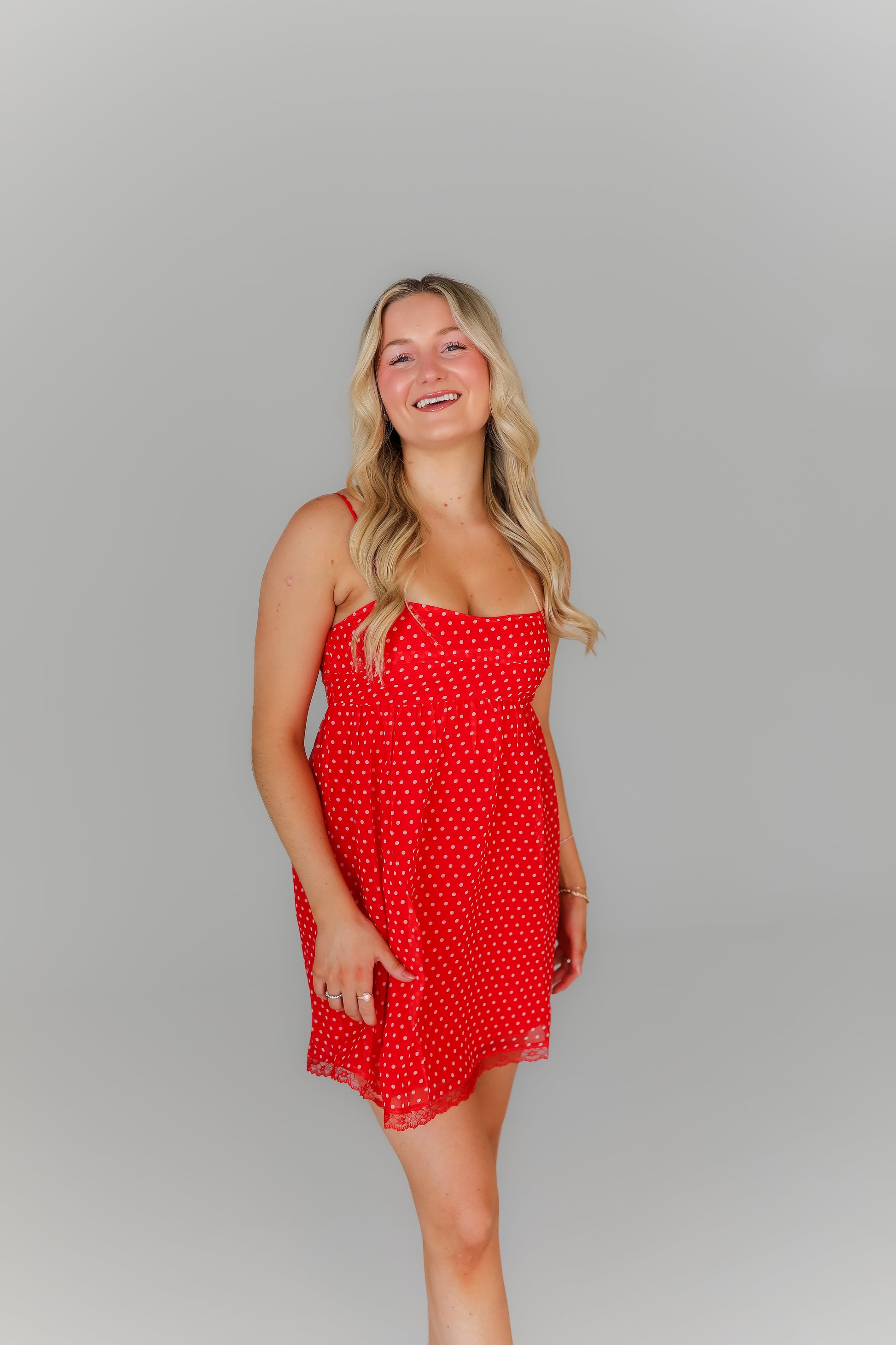 Red polka dot mini dress with spaghetti straps game day outfit