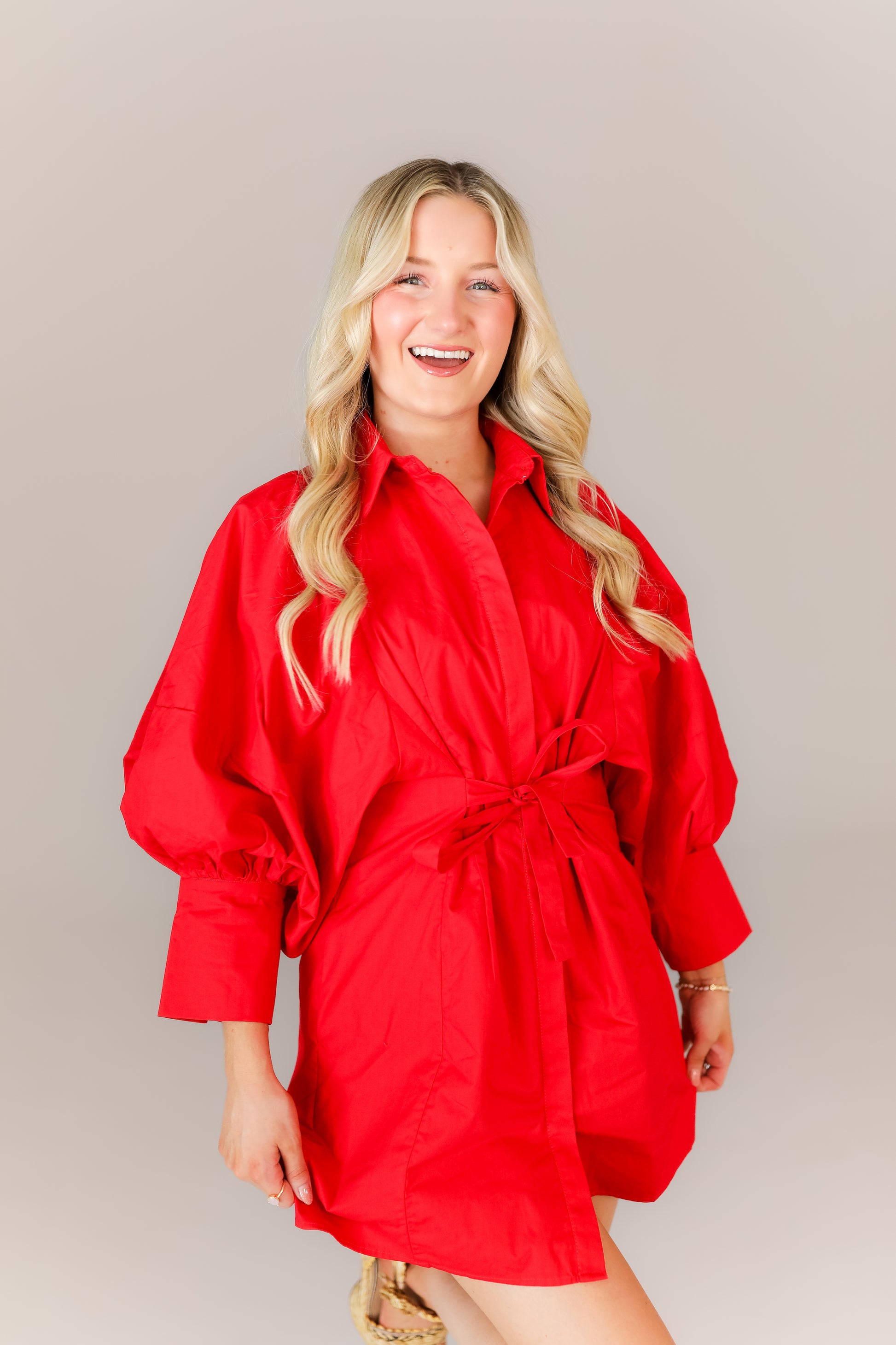 Red mini dress with balloon sleeves and waist tie game day outfit