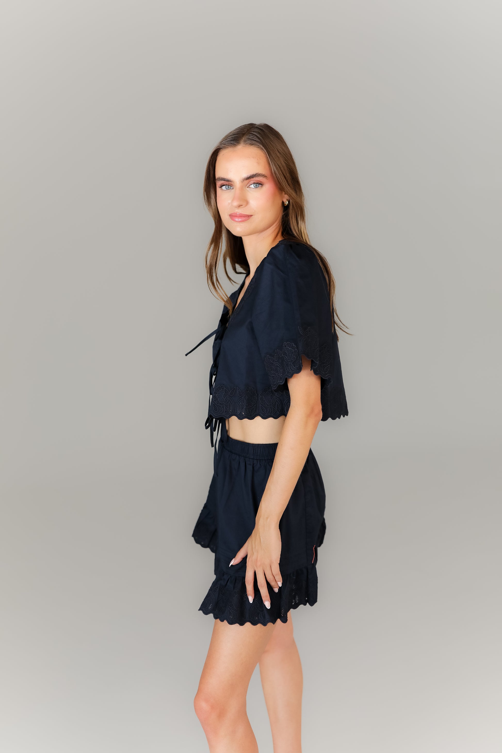 Women’s navy tie-front crop top with matching skirt boutique look