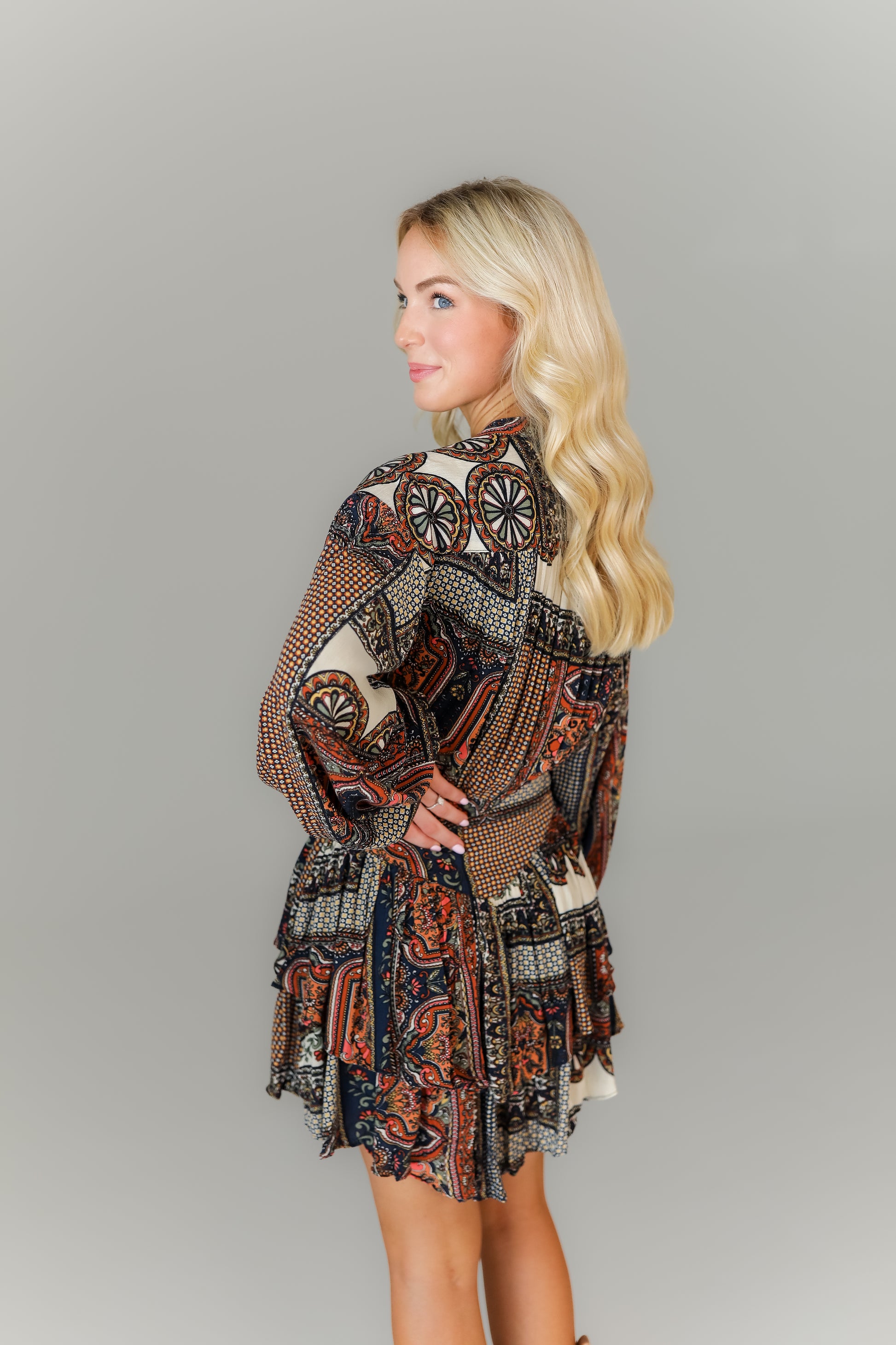 Back of paisley print long sleeve mini dress women’s boutique style