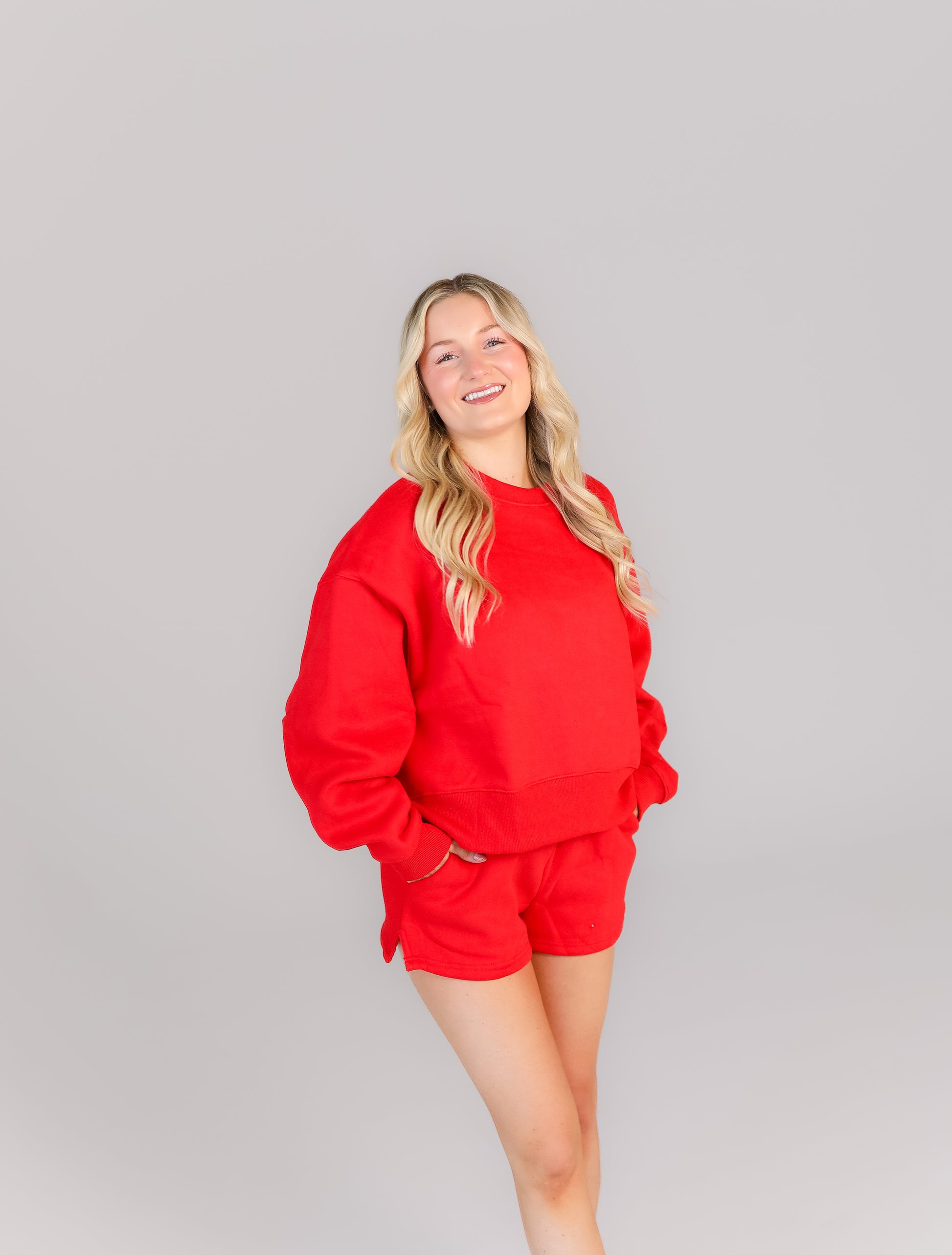 Women’s red lounge set with oversized sweatshirt and shorts