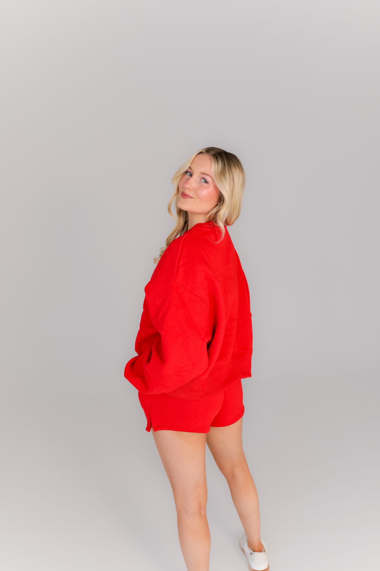 Women’s red oversized sweatshirt and shorts lounge set casual style