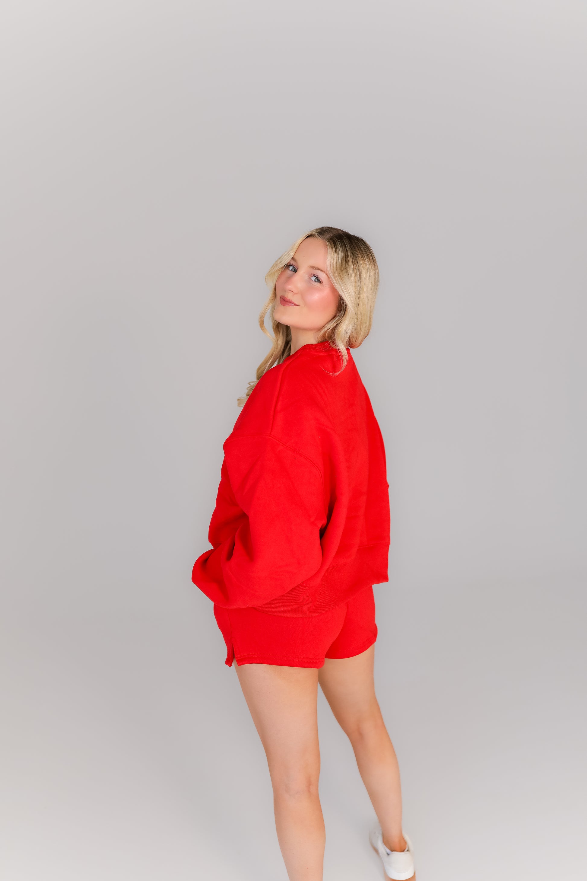 Women’s red oversized sweatshirt and shorts lounge set casual style