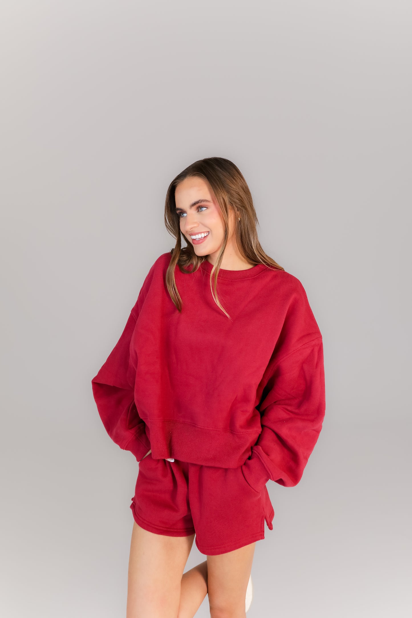 Women’s crimson lounge set with oversized sweatshirt and shorts