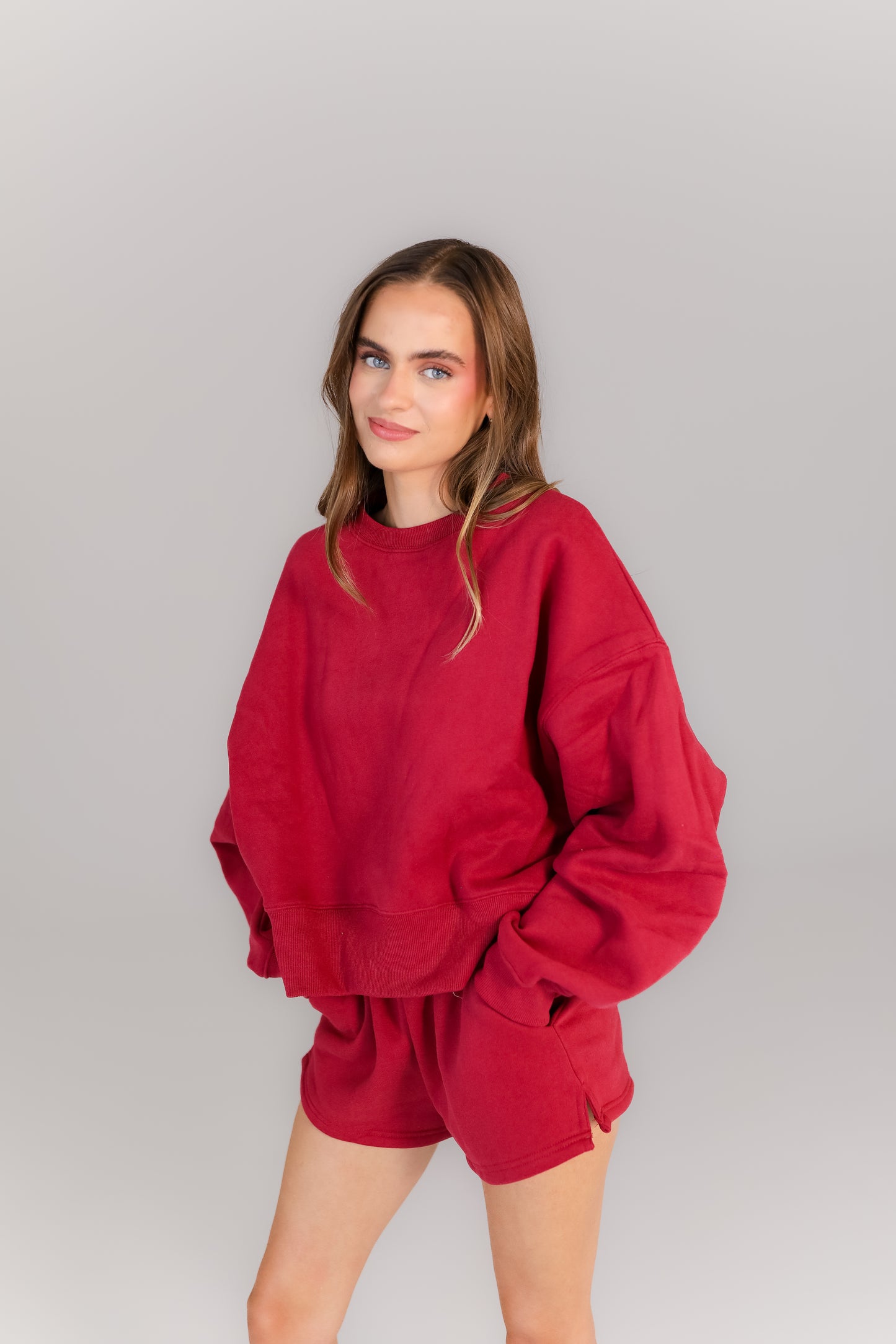 Women’s crimson lounge set with oversized sweatshirt and shorts
