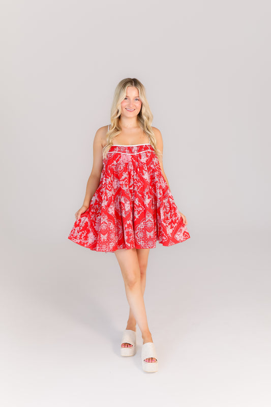 Red spaghetti strap mini dress with flowy tiered silhouette boutique style