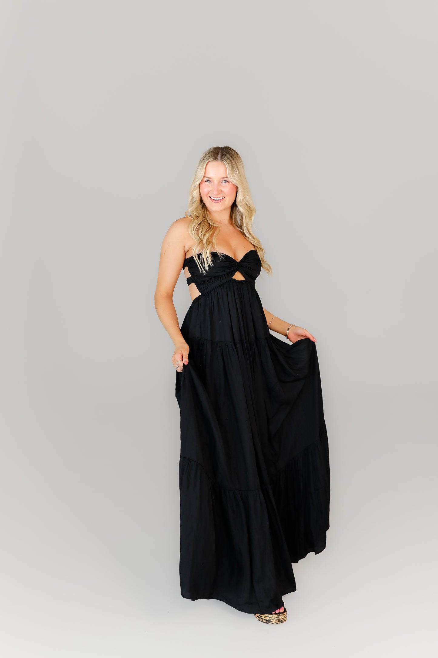 Women’s elegant black maxi dress perfect for weddings or formals