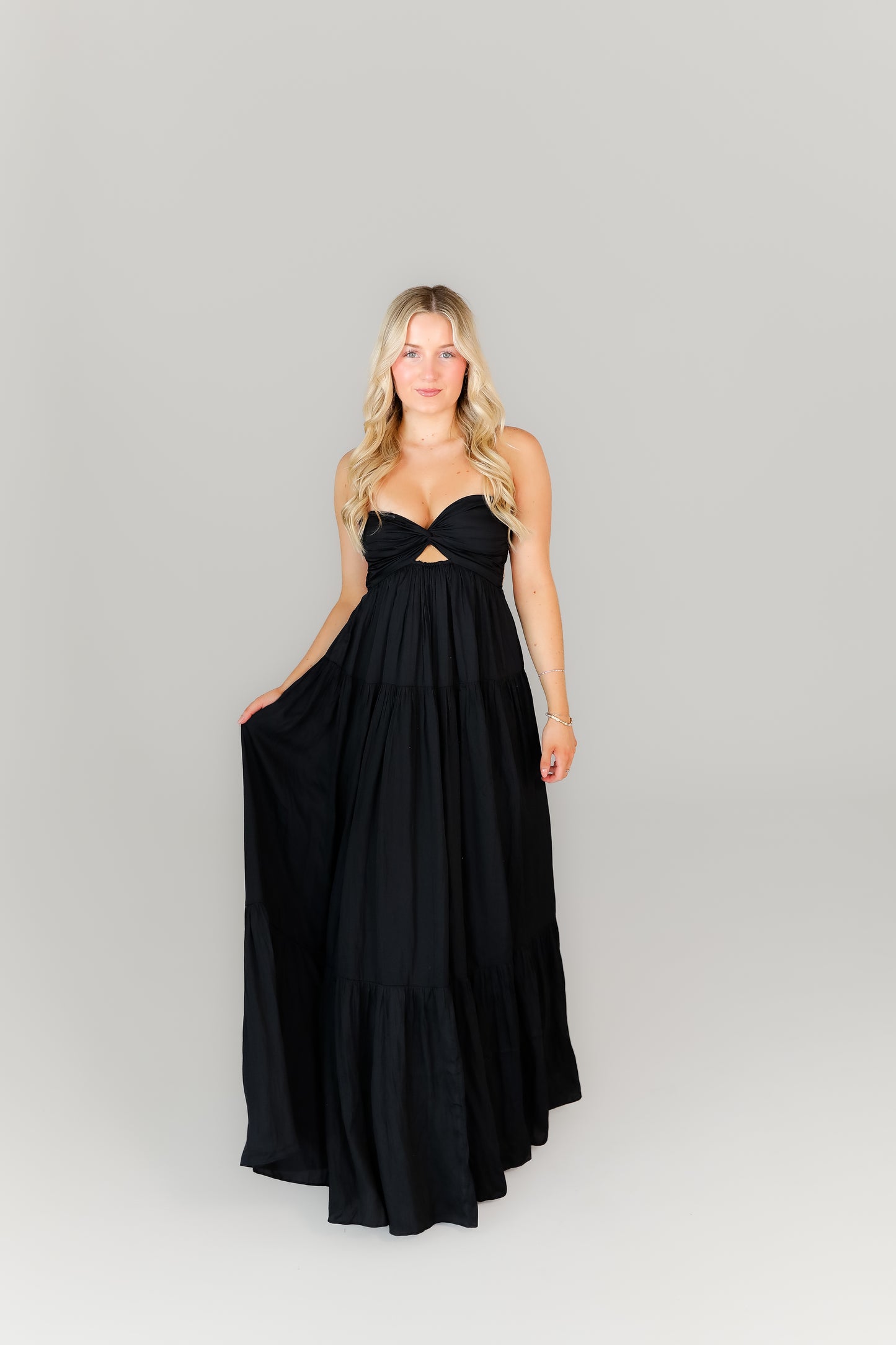 Black evening dress with a sweetheart neckline and adjustable straps