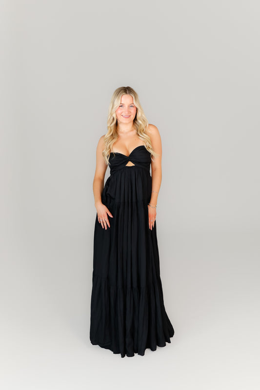Black maxi dress with sweetheart neckline and flowy skirt