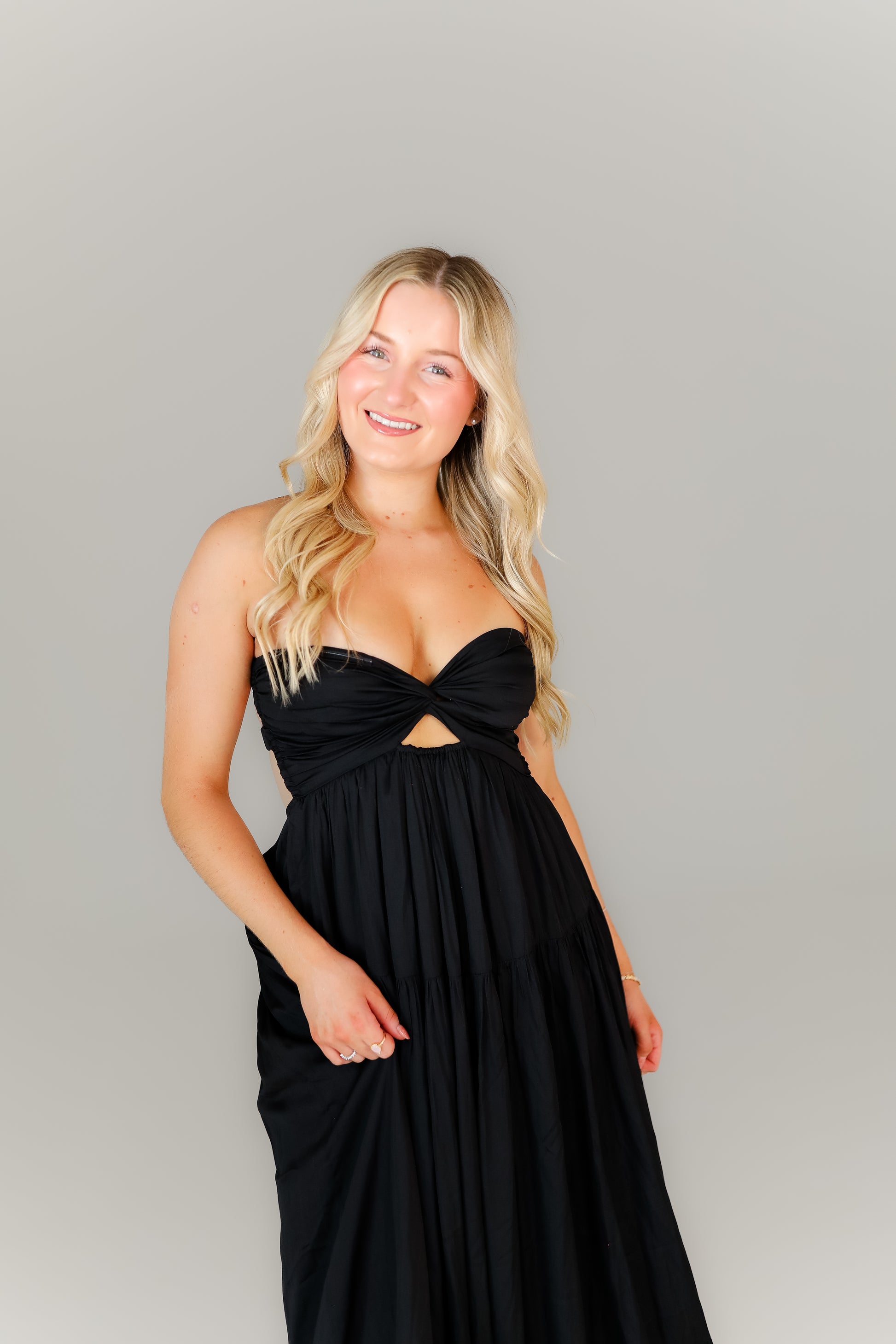 Black evening dress with a sweetheart neckline and adjustable straps