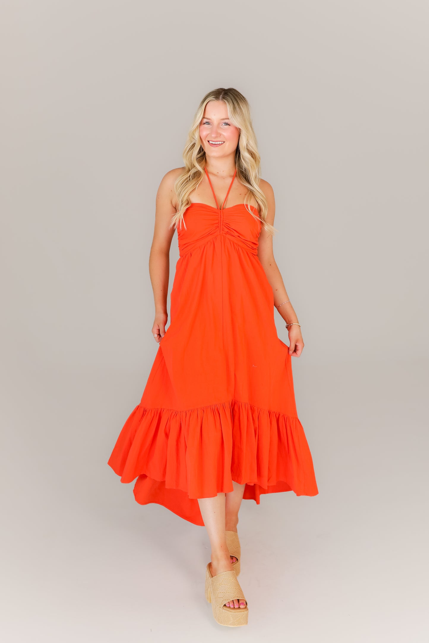 Boutique orange dress styled for sorority events and tailgates