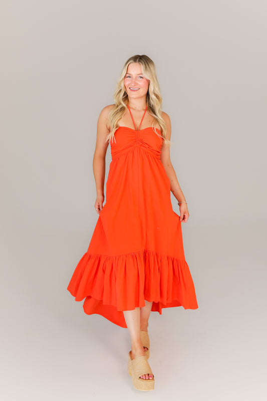 Boutique orange dress styled for sorority events and tailgates