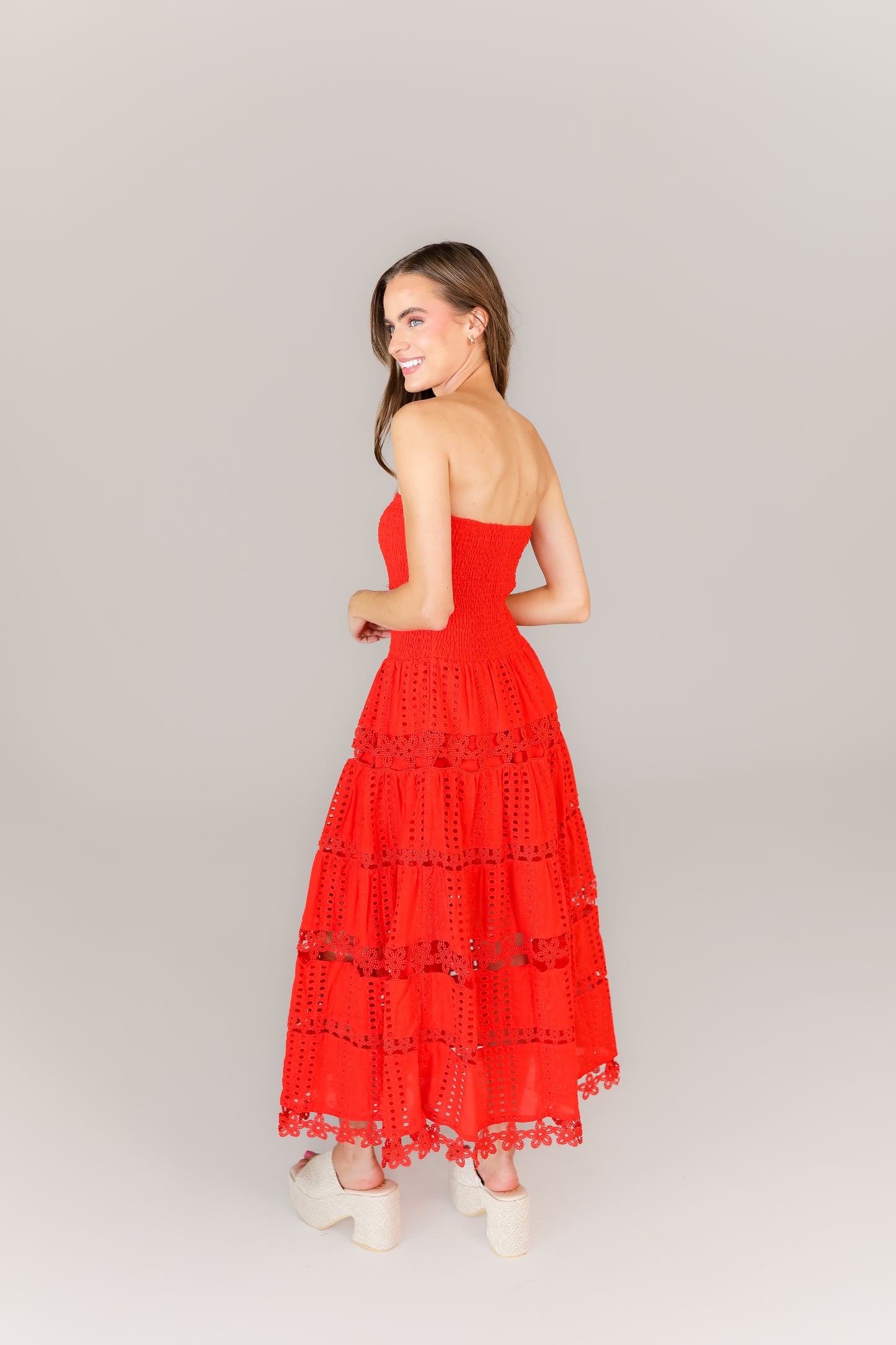 Boutique bright red midi dress with tiered layers for sorority or weekend events
