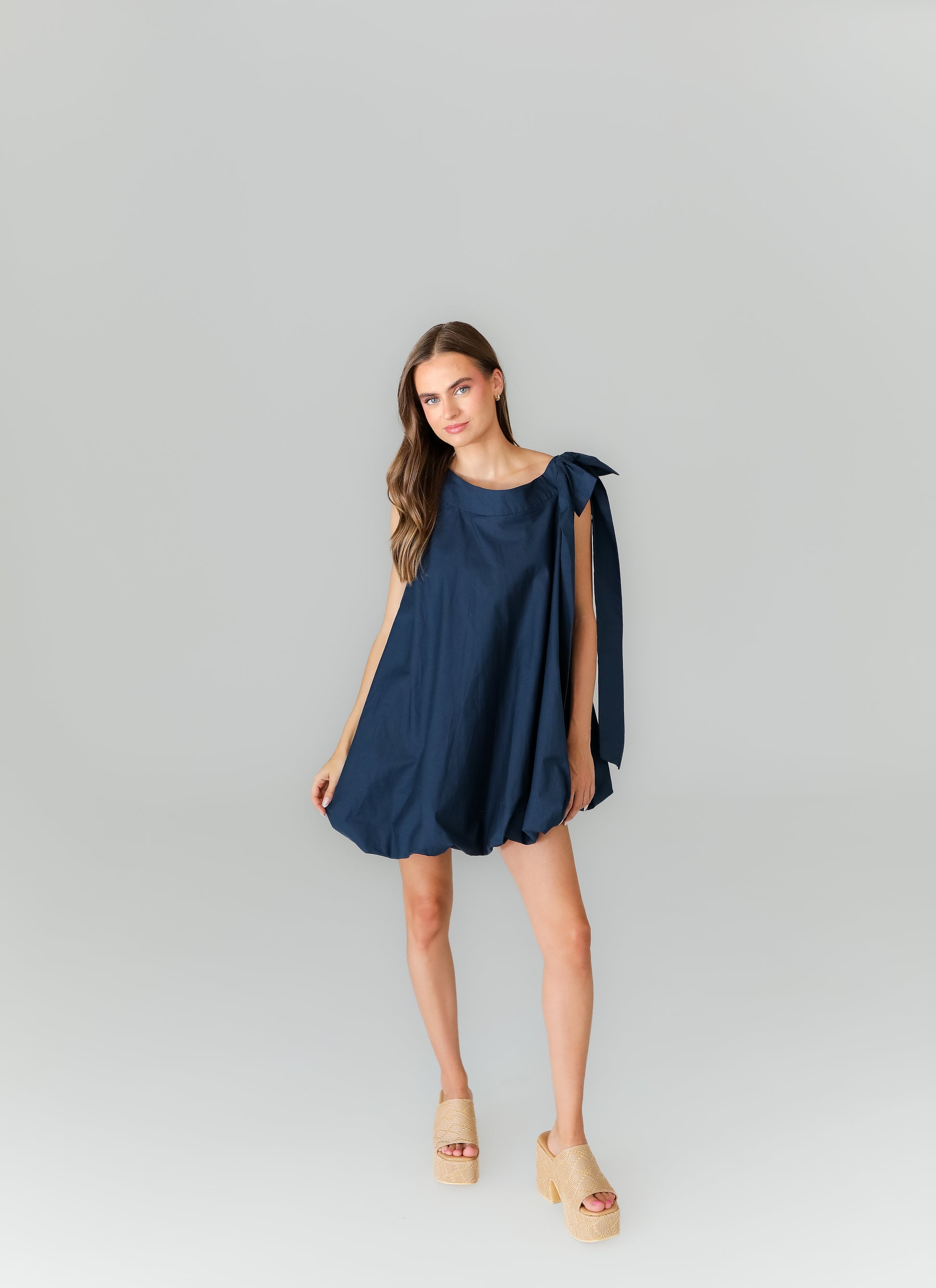 Navy blue mini dress with tie-shoulder straps for game day