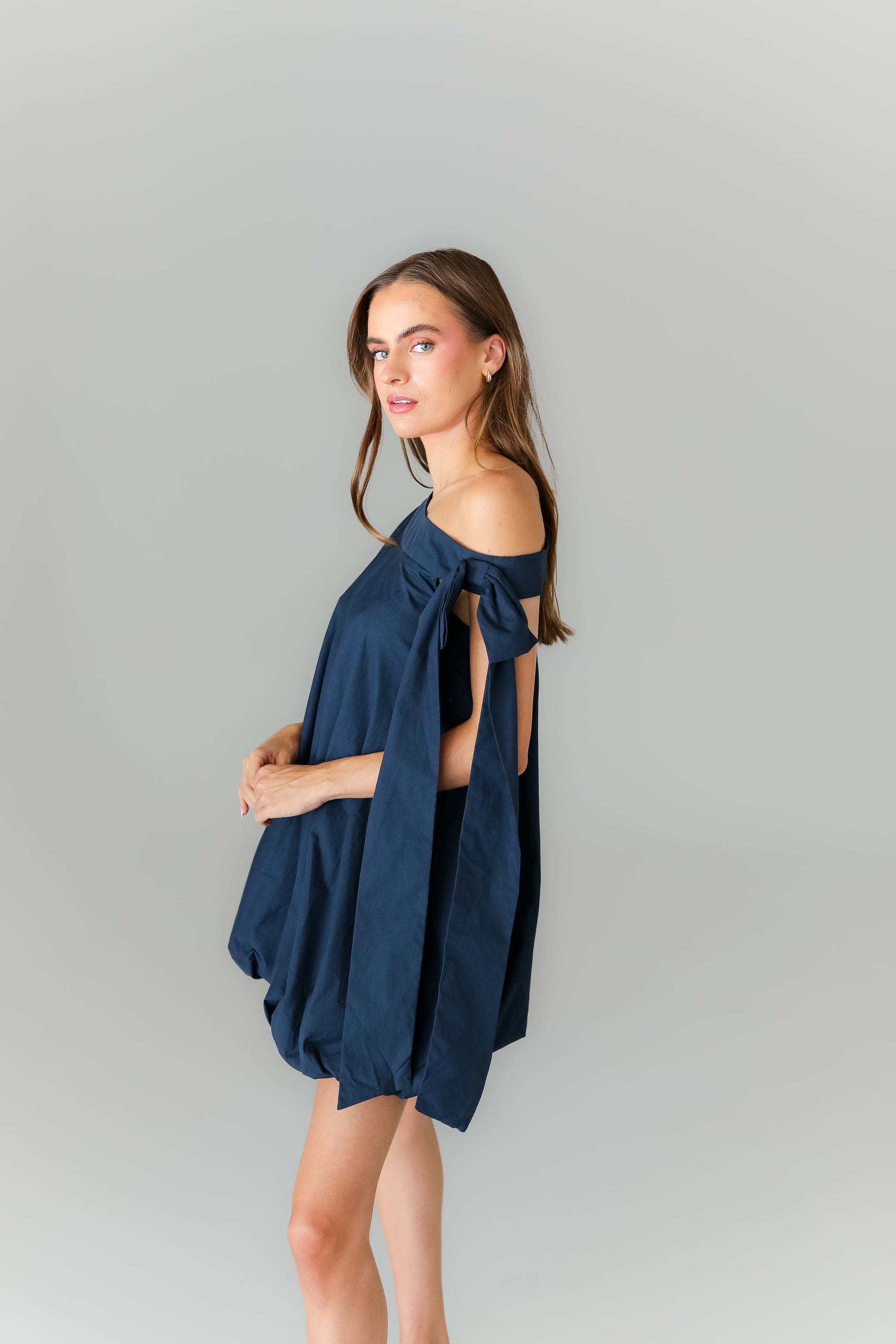 Women’s navy flowy mini dress boutique game day outfit